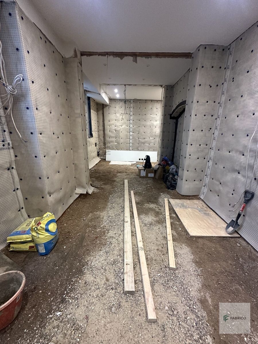 Basement structural work — brick walls and new ceiling