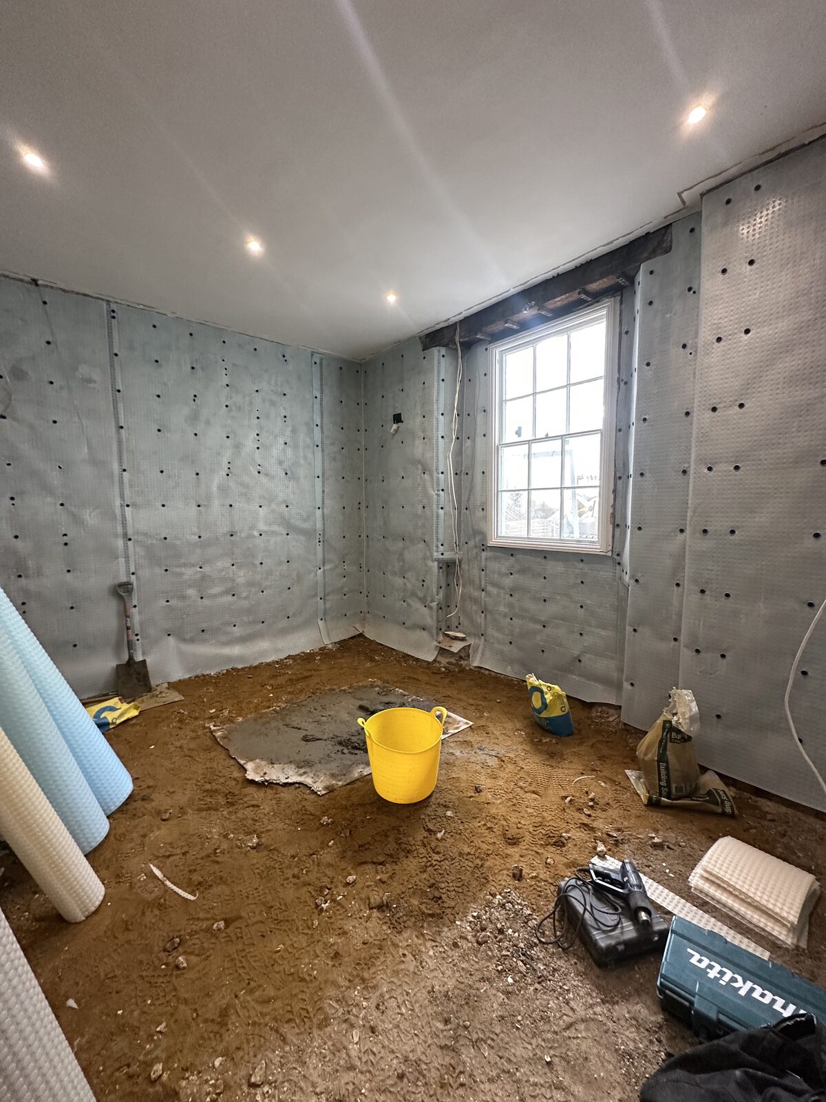Basement waterproofing — membrane coverage on all walls